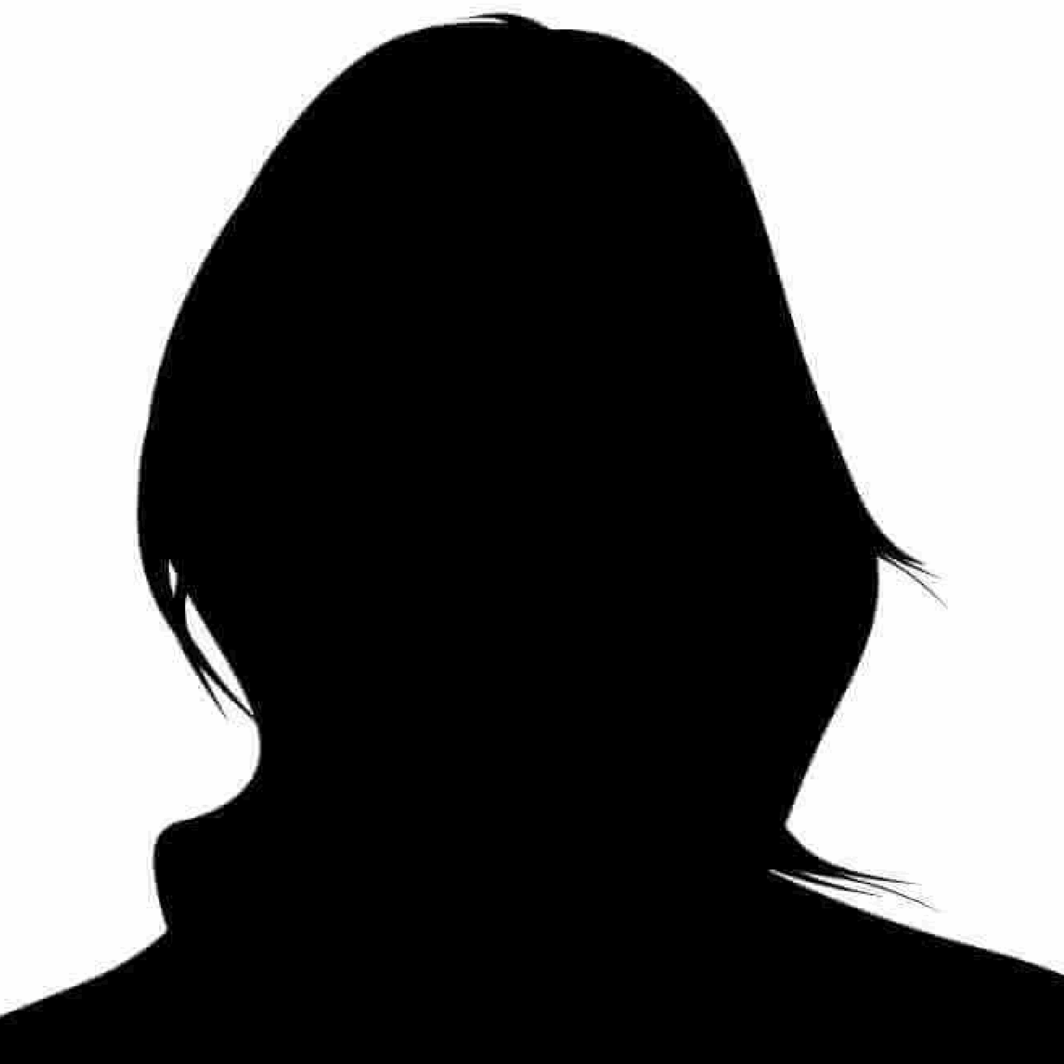 Silhouette of a person with shoulder-length hair.